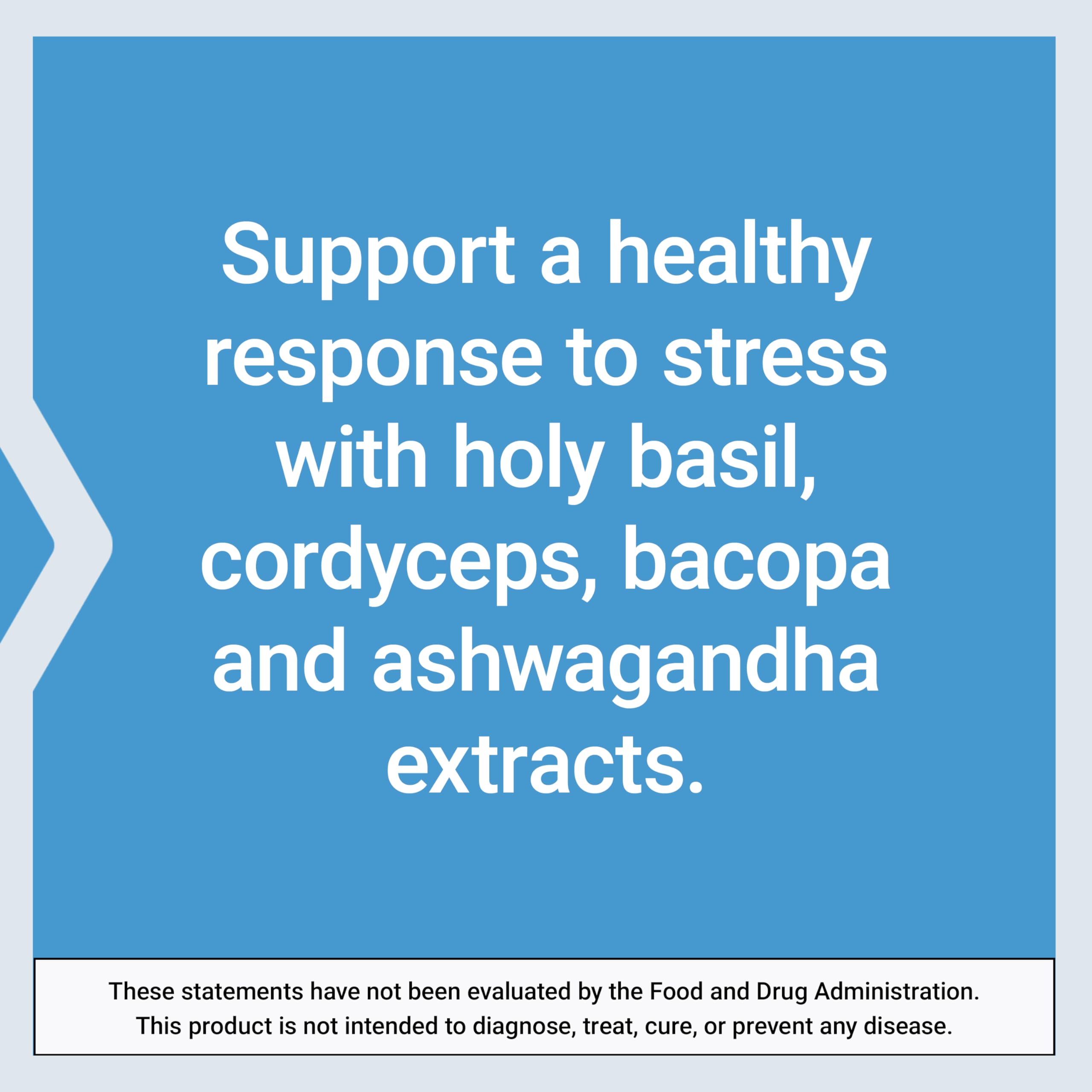 Life Extension Adrenal Energy Formula capsules on a wooden table
