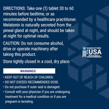Life Extension Melatonin 750 mcg Extended-Release Tablets on a wooden surface