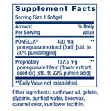 Life Extension Pomegranate Complete supplement capsules on a wooden surface