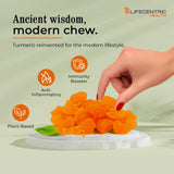 LifeCentric Health Turmeric Curcumin Gummies on a wooden table