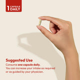 Lifestyle image of ANDREW LESSMAN Healthy Hair, Skin & Nails capsules with a glass of water