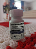 Lifestyle image of Forever Living Products B12 Plus B-Complex supplement on a table