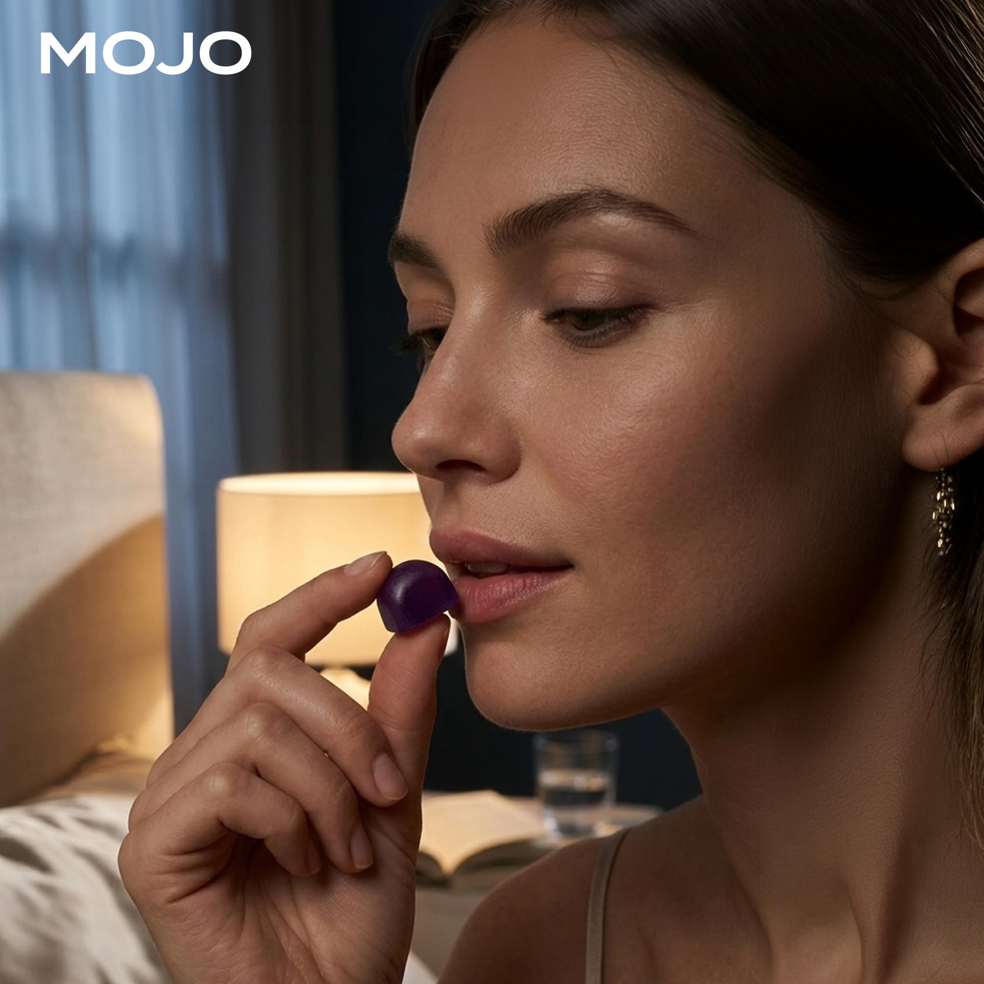 Lifestyle image of Mojo Sleep Gummies on a bedside table