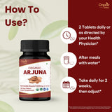 Lifestyle image of ORGANIC SPREE Arjuna Tablets on a wooden table