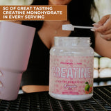 Lifestyle image of Primeval Labs Flavored Creatine in a gym setting