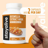 Lifestyle image of STAY ALIVE Boswellia Serrata Capsules on a table
