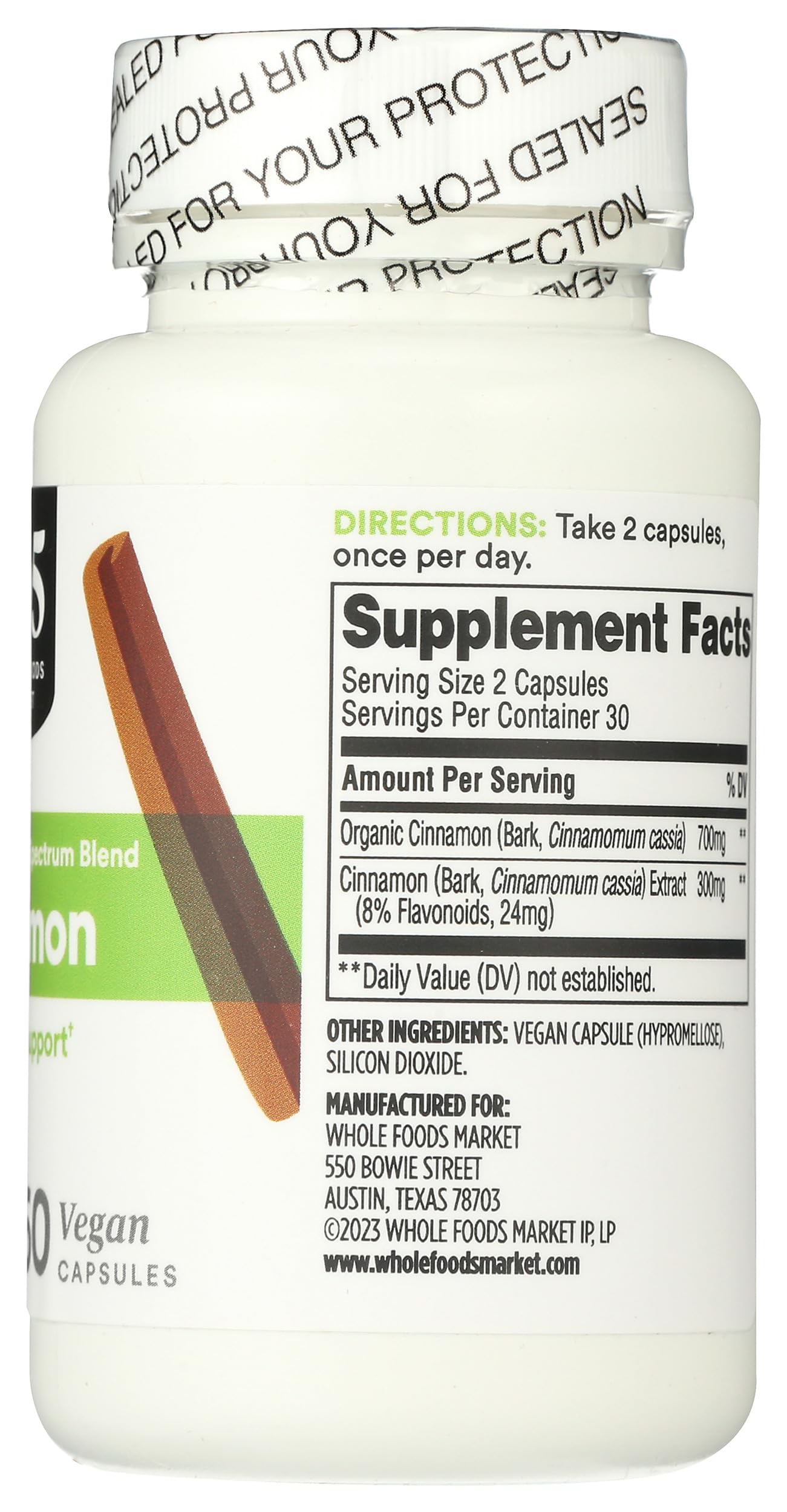 Lifestyle scene with 365 by Whole Foods Market Cinnamon Supplement on a kitchen counter