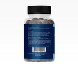 Lifestyle scene with Avinol PM Sleep Gummies next to a glass of water