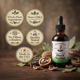 Lifestyle scene with Christopher's Black Walnut Extract 2 oz on a kitchen counter