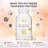 Lifted Naturals Mood Probiotic capsules with a glass of water
