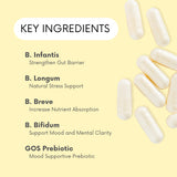 Lifted Naturals Probiotic Supplement capsules on a wooden surface