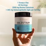 Live Conscious Colostrum Powder unflavoured powder scoop