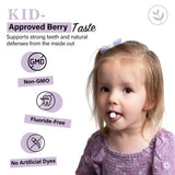 Living Well Chewable Kids' Vitamins in a child's hand