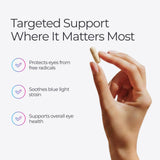Livingood Daily Eye Support capsules on a wooden surface