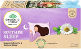 Loose leaves of ORGANIC INDIA Tulsi Sleep Organic Tea displayed on a wooden surface