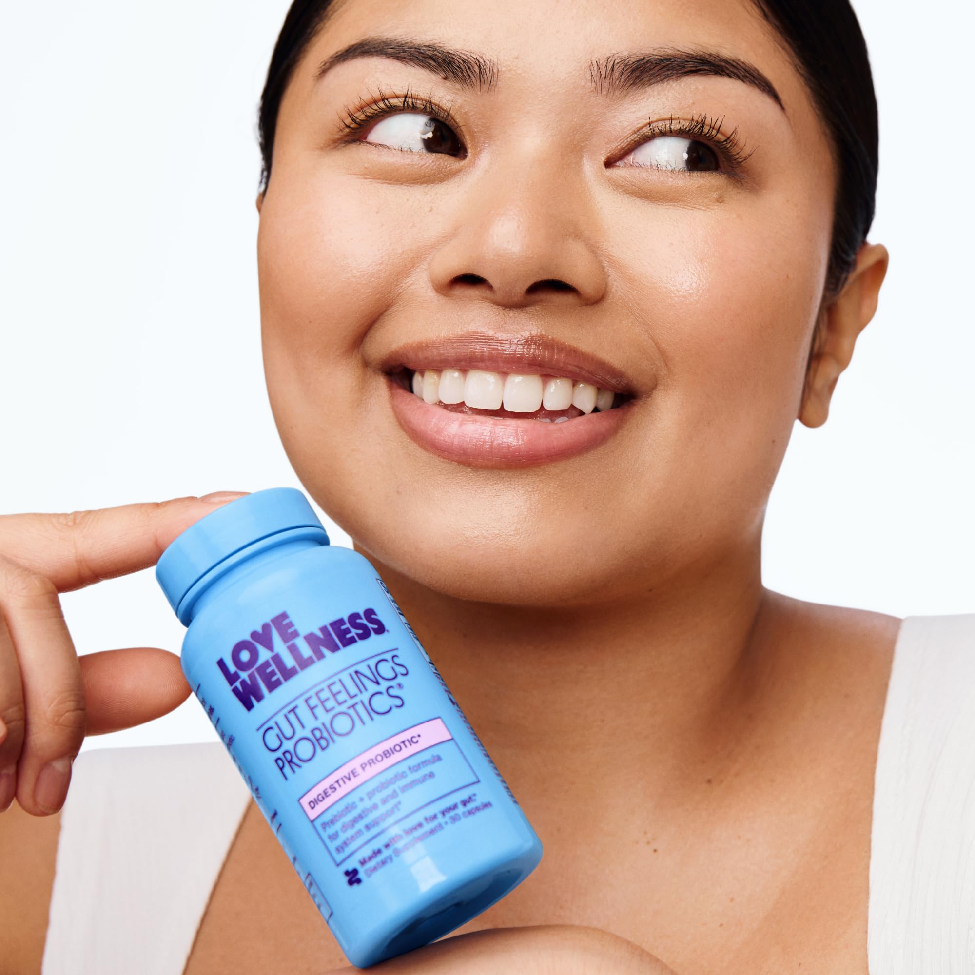 Love Wellness Gut Feelings Probiotic capsule open with powder