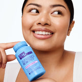 Love Wellness Gut Feelings Probiotic capsule open with powder
