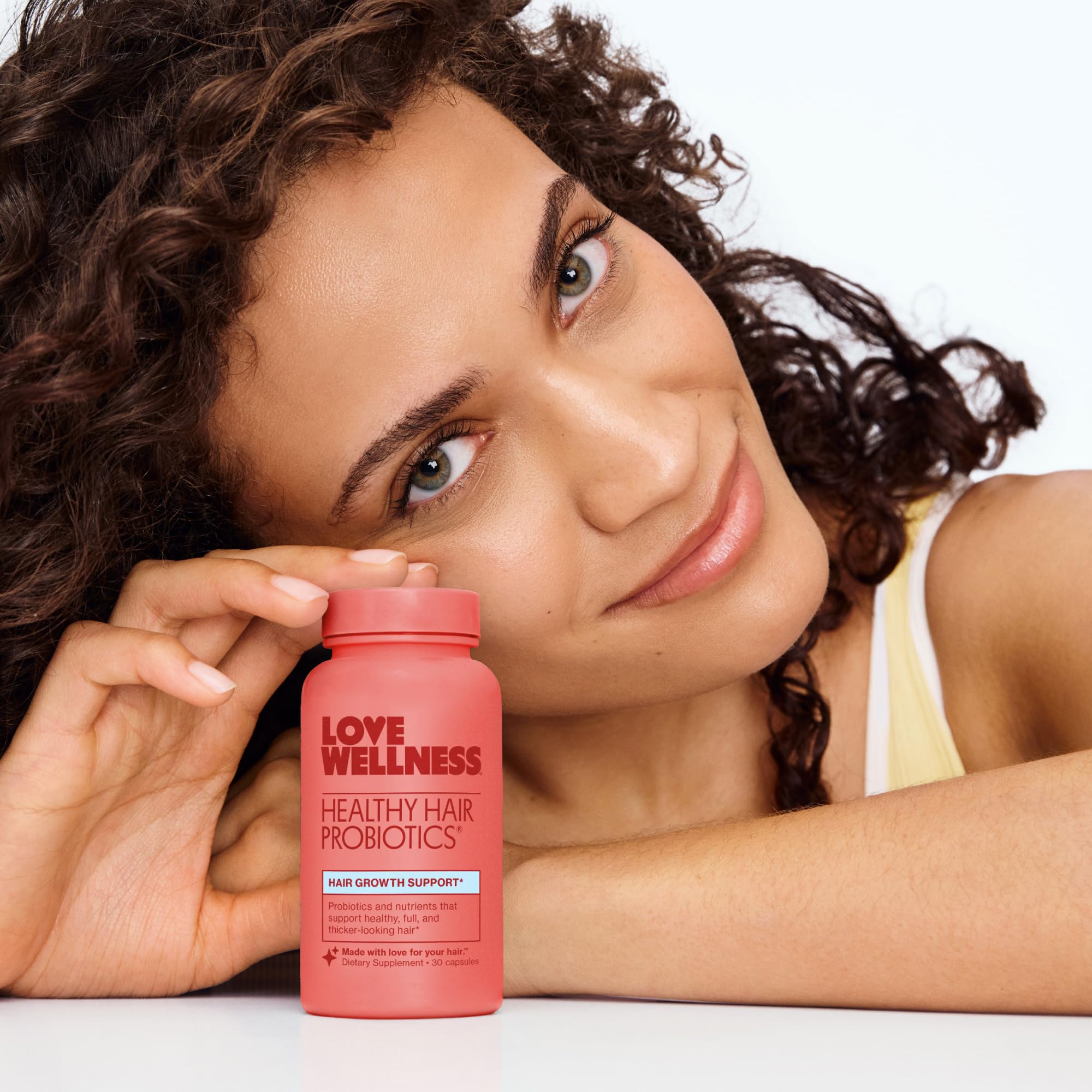 Love Wellness Healthy Hair Probiotics bottle with capsules