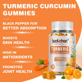 LUCKCHAN Turmeric Curcumin Gummies on a wooden table