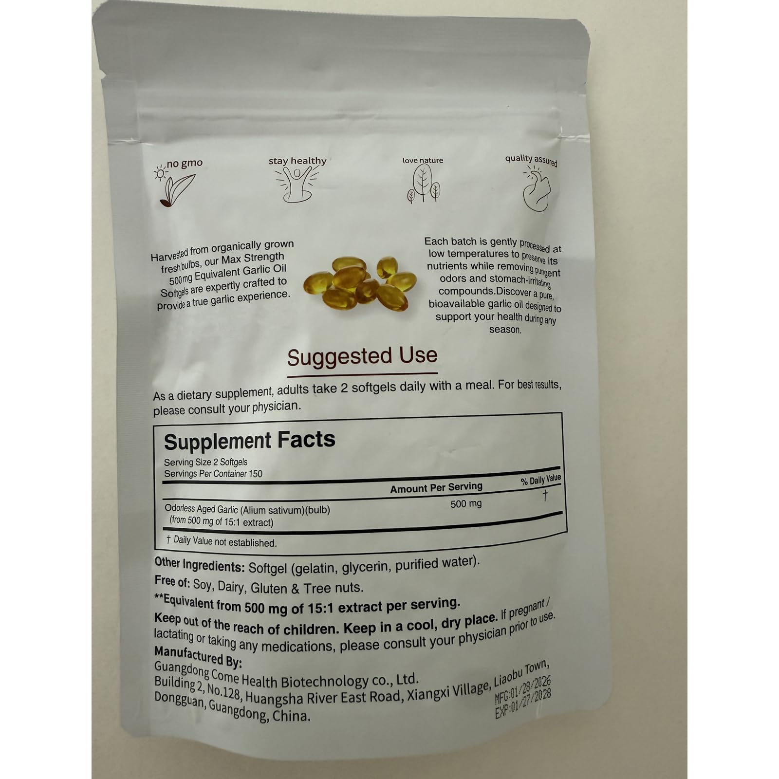 Lumine Organics Aged Garlic Extract Capsules displayed on a wooden table
