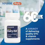 MAJOR Original Dairy Aid caplets in a glass of water