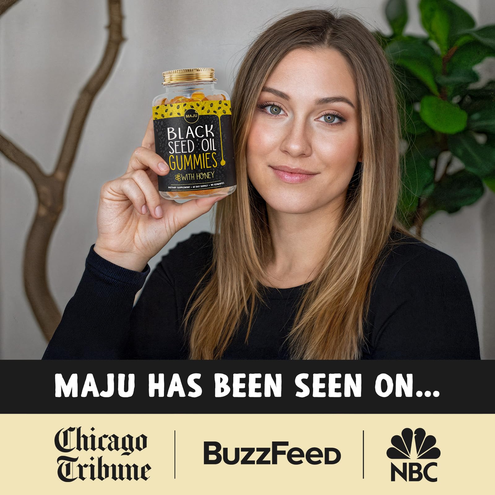 Maju Superfoods Black Seed Oil Gummies displayed with a spoonful of gummies
