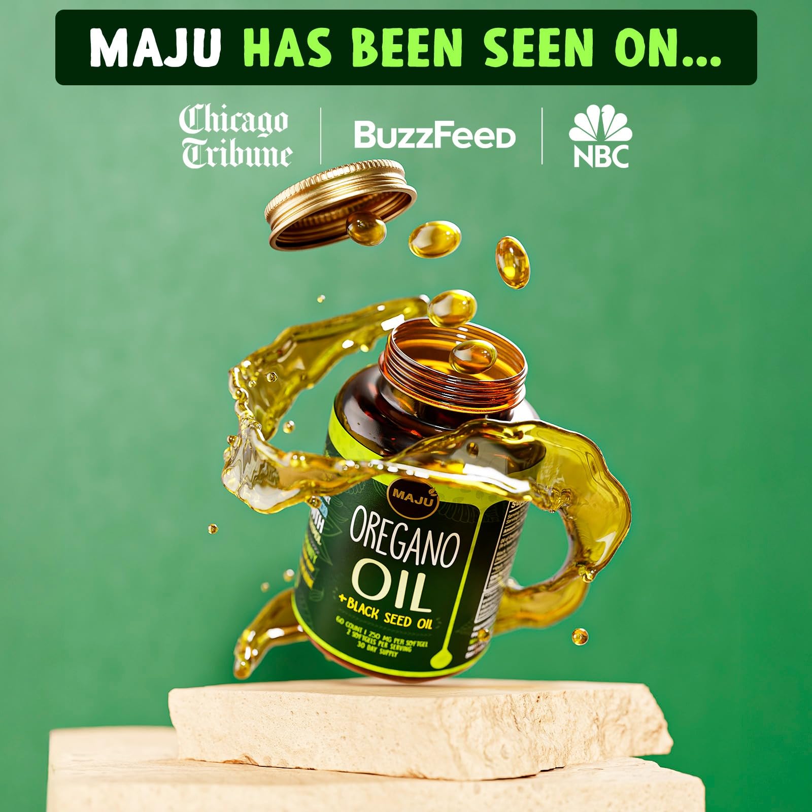 Maju Superfoods Oregano Oil & Black Seed Oil Capsules on a wooden table