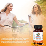 MARYRUTH'S Probiotic Turmeric+ capsules on a wooden table