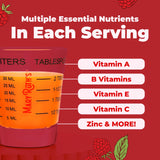 MARYRUTH'S Raspberry Liquid Multivitamin with a glass of smoothie