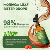 MaxuraFit Moringa Leaf Drops in a glass with water