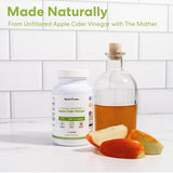MaxX Labs Apple Cider Vinegar Capsules on a wooden table