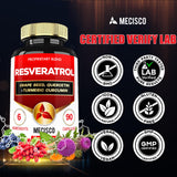 Mecisco Resveratrol supplement capsules on a wooden surface