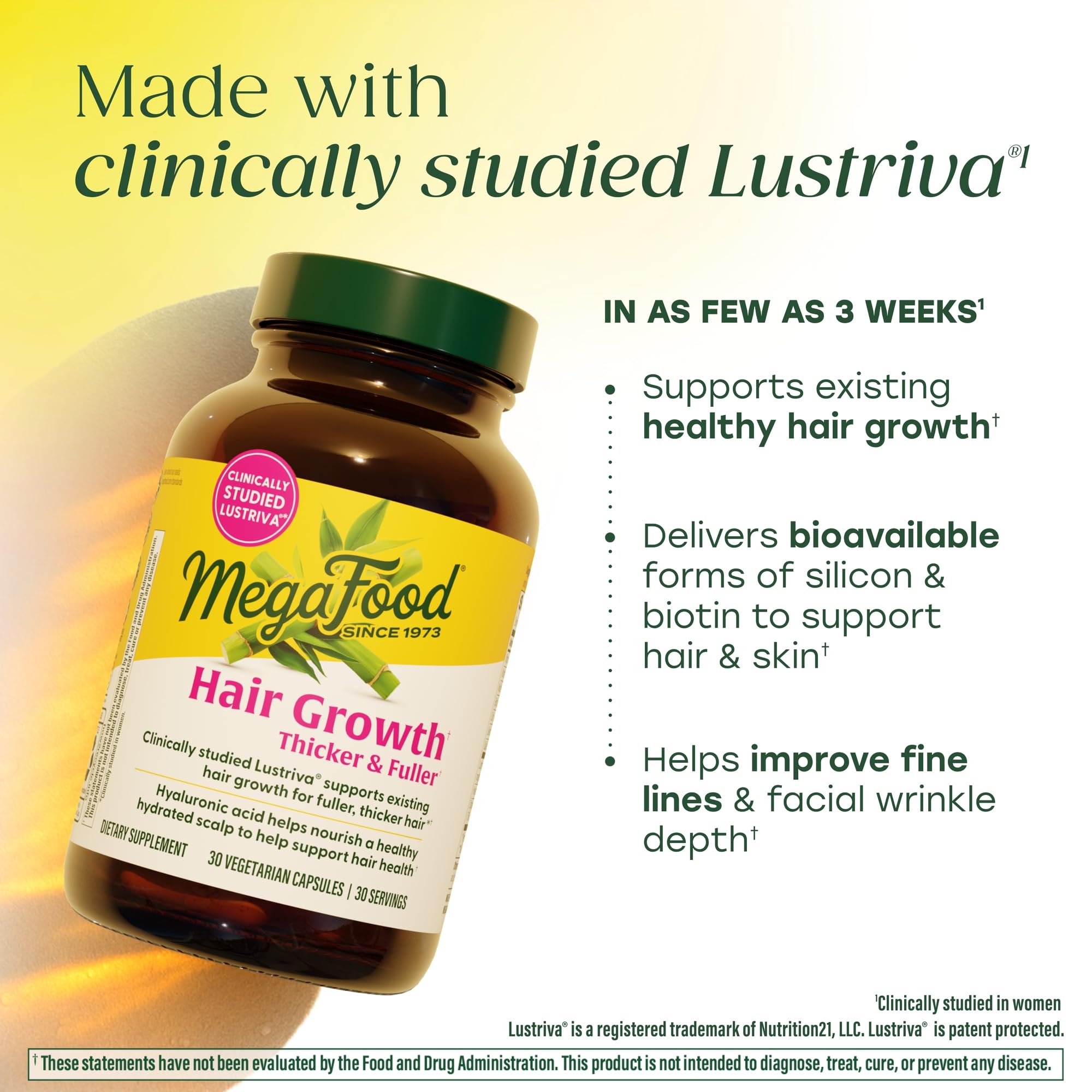 MegaFood Hair Growth Support Capsules with a glass of water