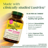 MegaFood Hair Growth Support Capsules with a glass of water