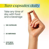 MegaFood Liposomal Vitamin C Capsules with a glass of water