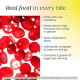 MegaFood Multivitamin Chewables for Women on a wooden table with fresh berries