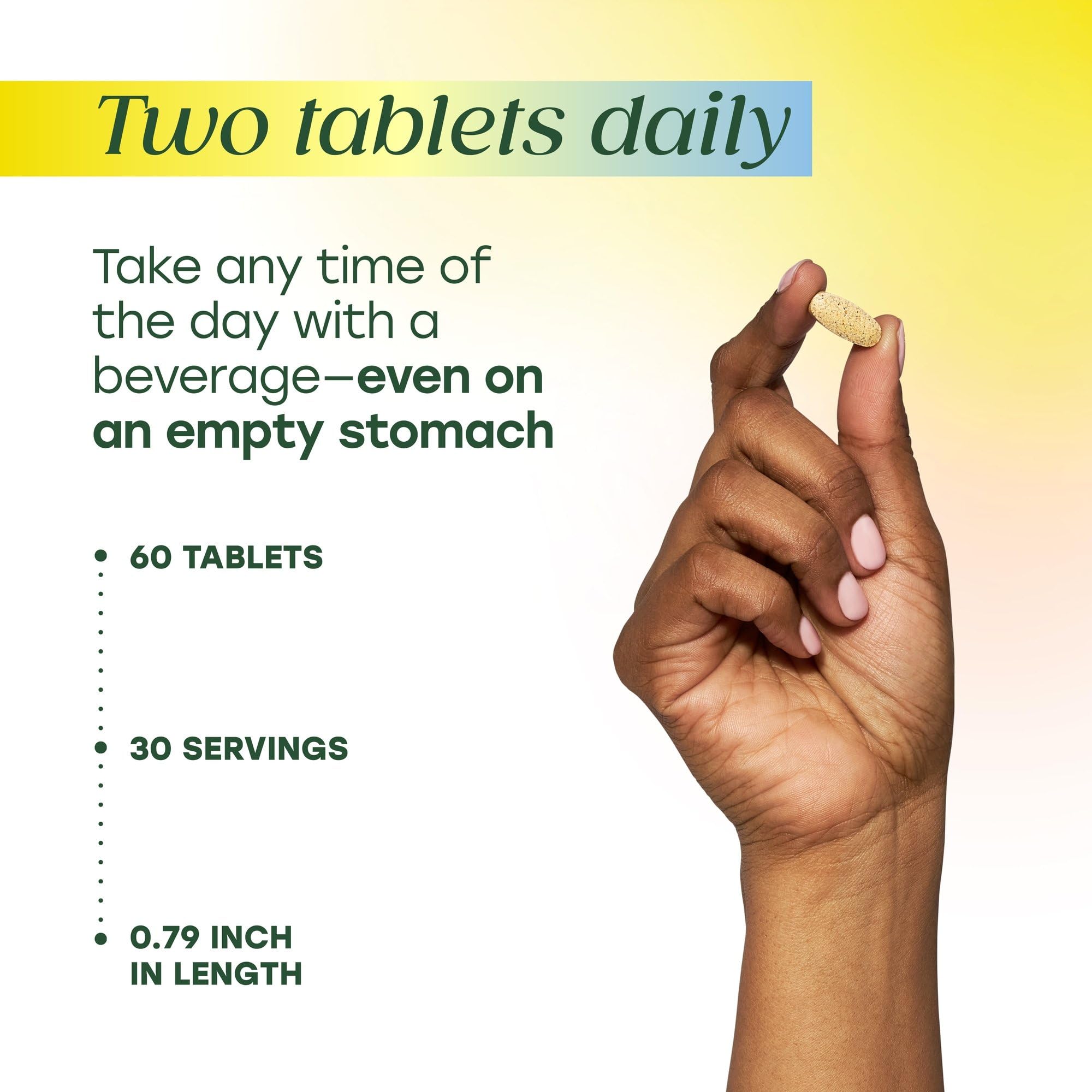 MegaFood Multivitamin for Women 40+ tablets in a hand