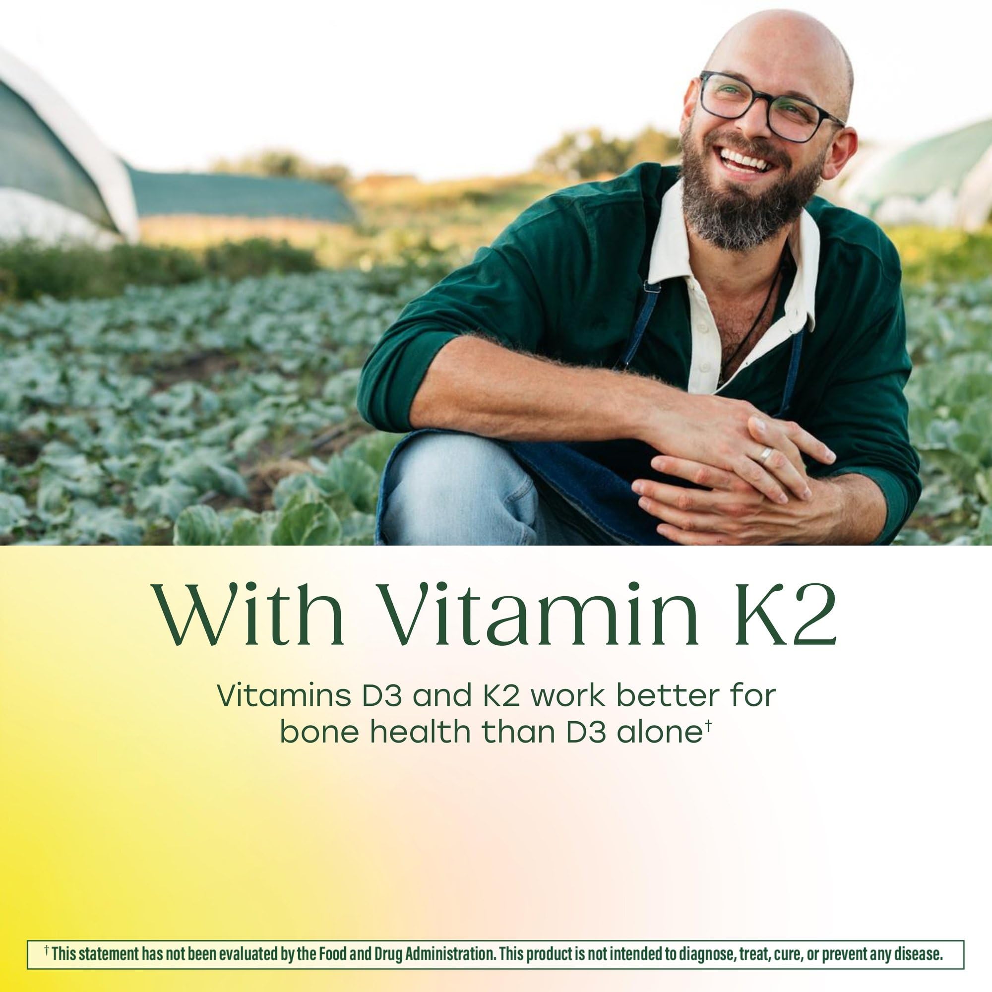 MegaFood Vitamin D3 & K2 capsules on a wooden table