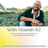 MegaFood Vitamin D3 & K2 capsules on a wooden table