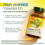 MegaFood Vitamin D3 & K2 capsules with a measuring spoon