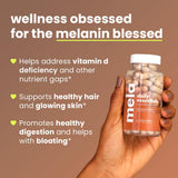 Mela Daily Essentials Multivitamin bottle side view