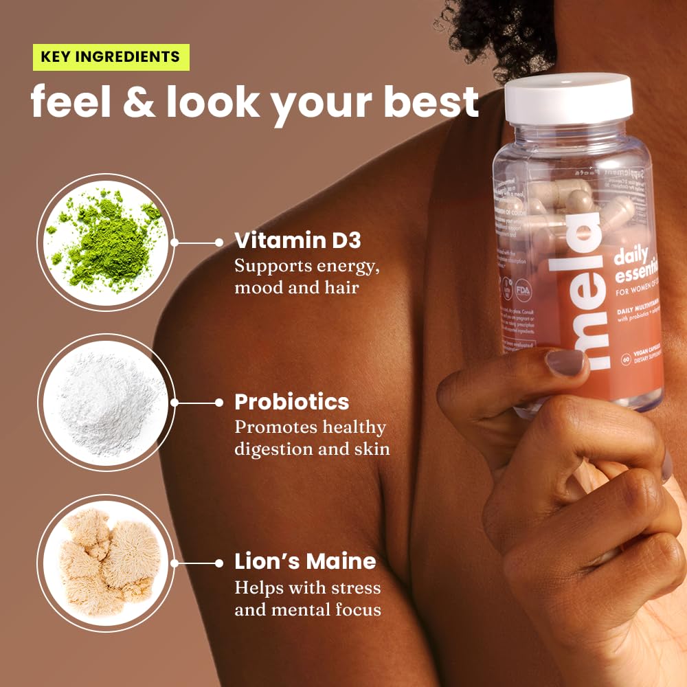 Mela Daily Essentials Multivitamin capsules on a wooden table