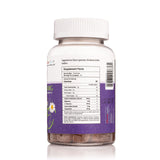 Melat-8 Sleep Gummies with a glass of water