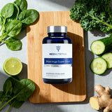 Meo Nutrition Moringa Capsules 800mg with capsules on a table