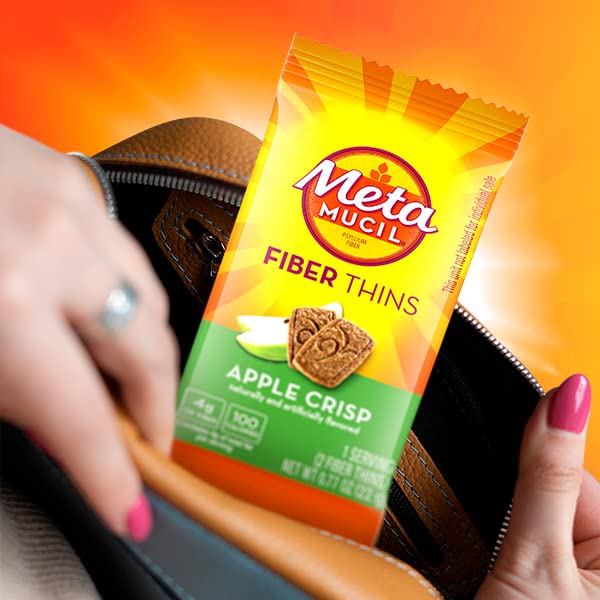 Metamucil Apple Crisp Fiber Thins on a picnic table