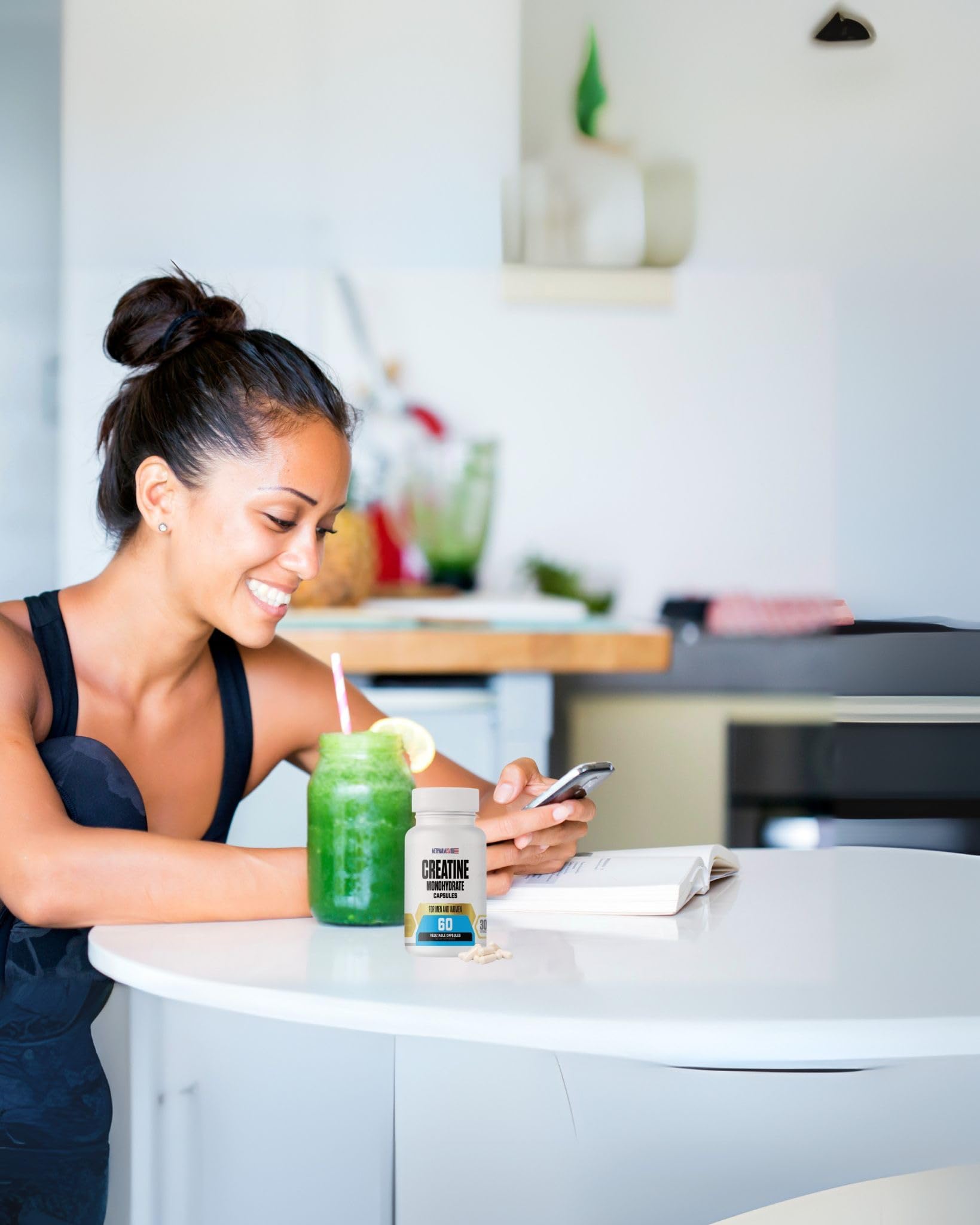 MetpharmUSA Creatine Monohydrate Capsules with a glass of water