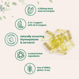 Micro Ingredients Black Seed Oil and Oregano Oil softgels in a bowl