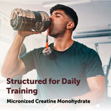 Micro Ingredients Creatine Monohydrate Powder in a shaker