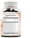 Micro Ingredients Mega Mushroom Gummies displayed with fresh raspberries and pomegranates