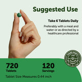 Micro Ingredients Organic Spirulina Tablets on a wooden table